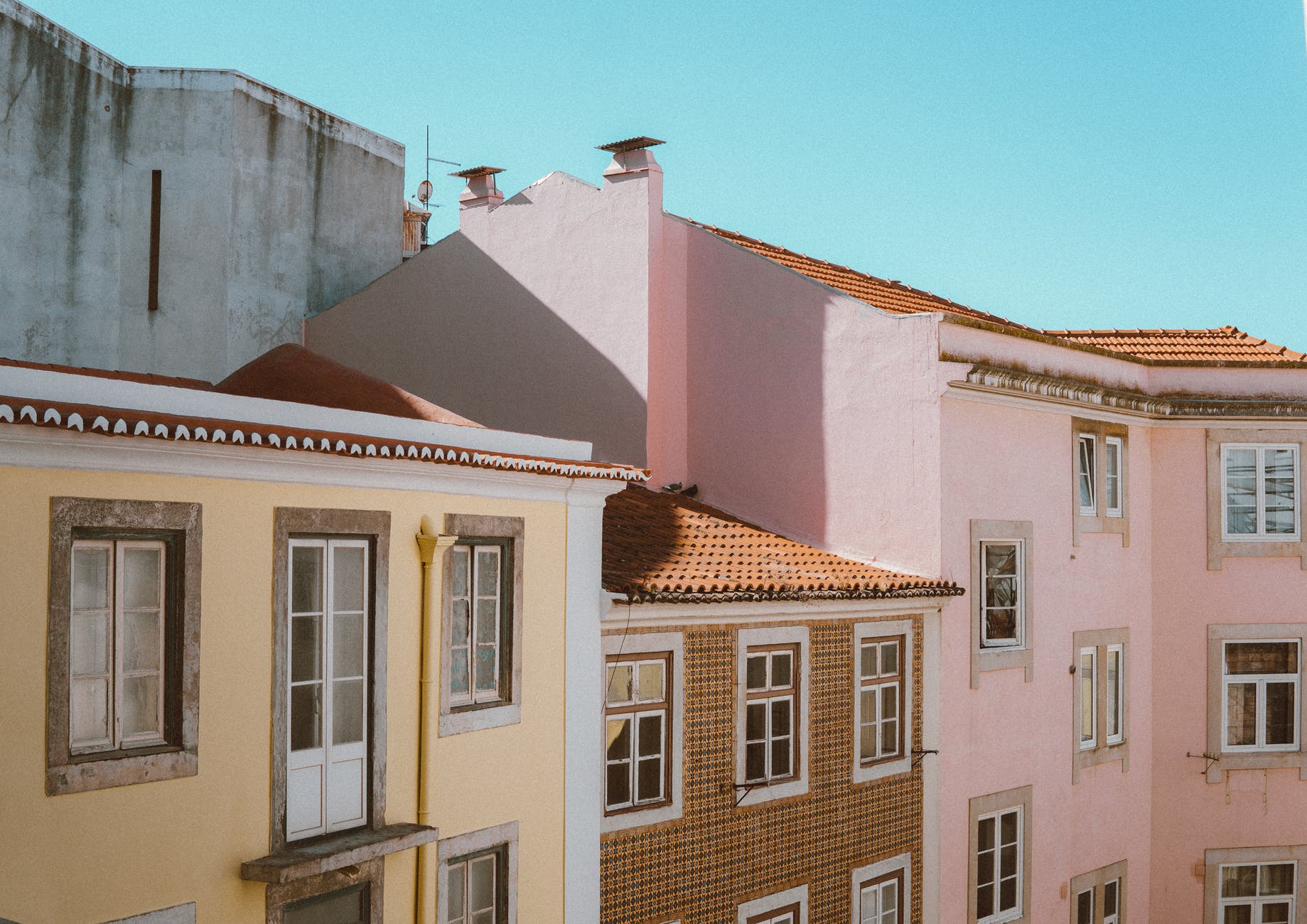architectural photography of building under blue sky