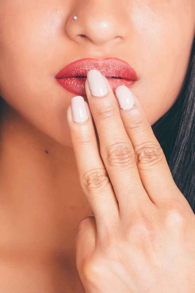 person s right three fingers