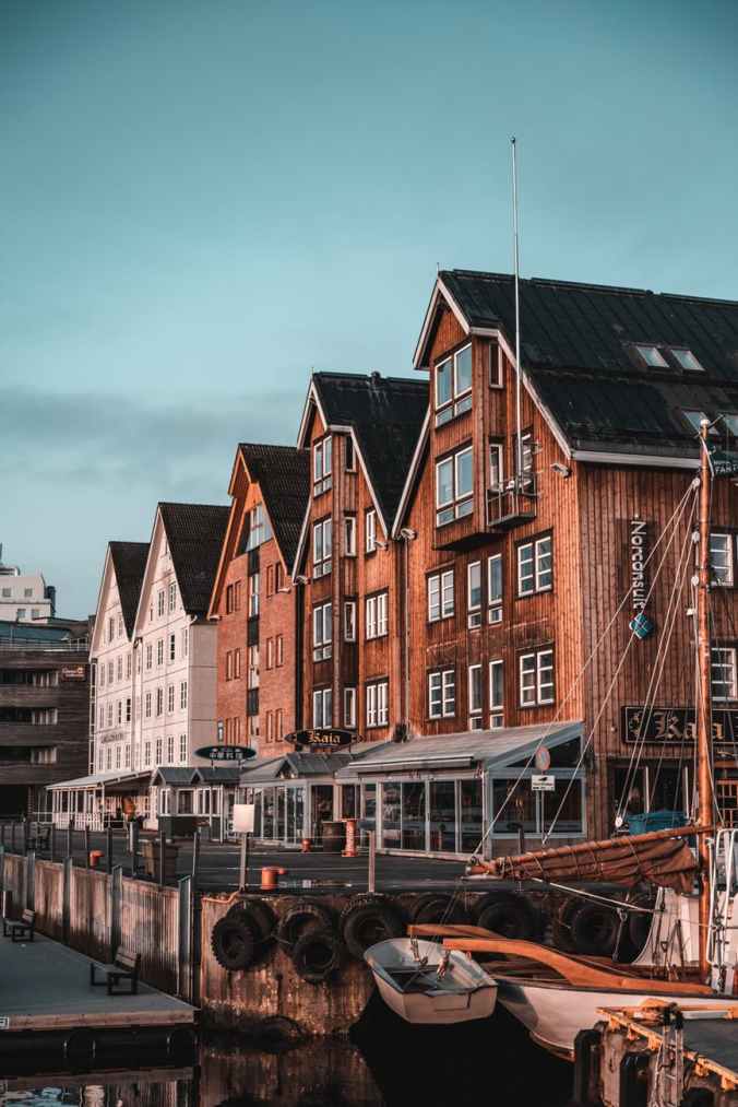 orange concrete houses under blue sky