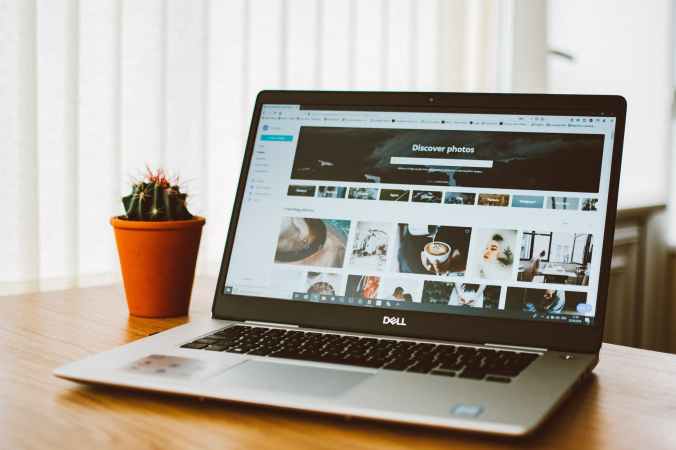 dell laptop computer on table